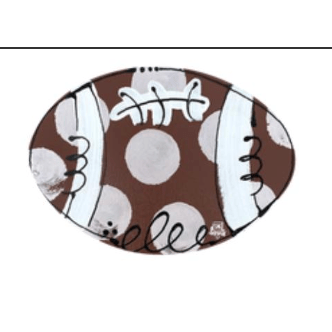 Decorative item resembling a football with white patterns on a brown background