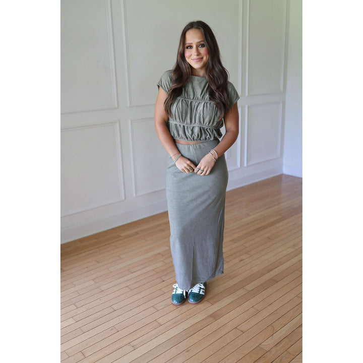 Woman in a green outfit