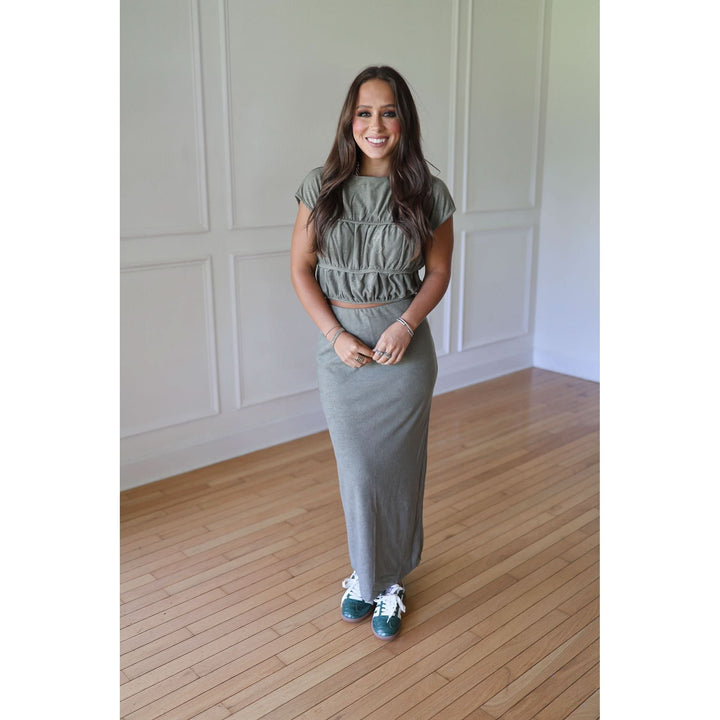 Woman in a green outfit