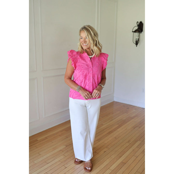 Woman wearing a bright pink top