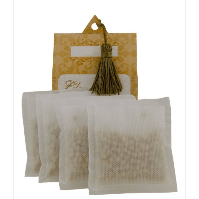 Tea bags with a decorative packaging on a white background
