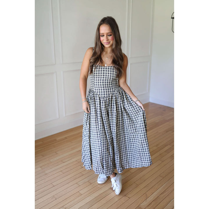 Woman wearing a black and white checkered dress