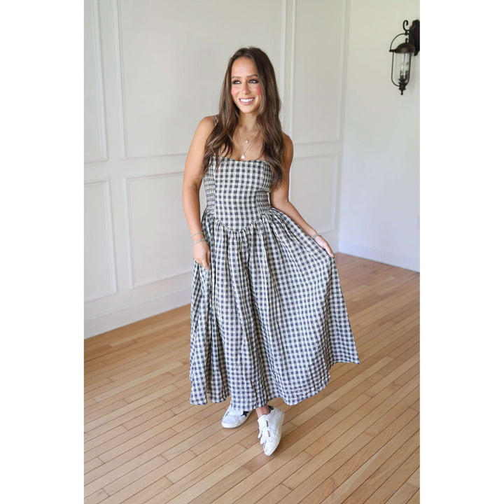 Woman wearing a black and white checkered dress