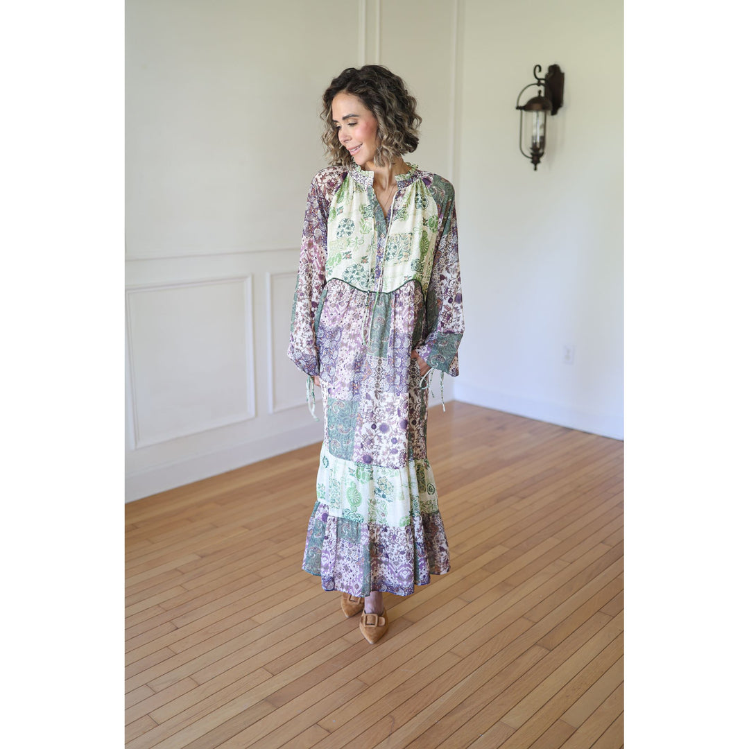 Woman wearing a long, patterned dress 