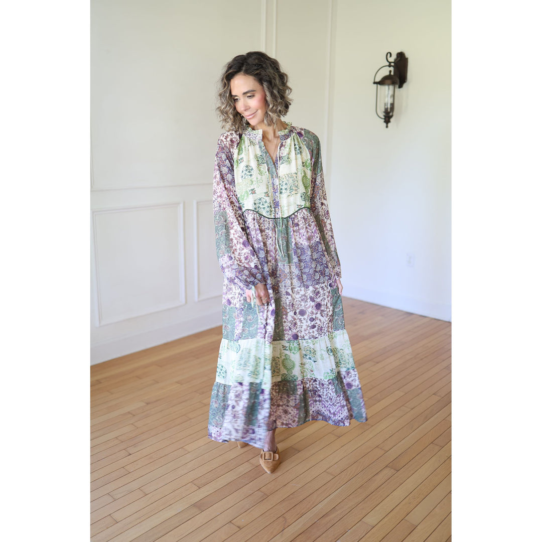 Woman wearing a long, patterned dress 