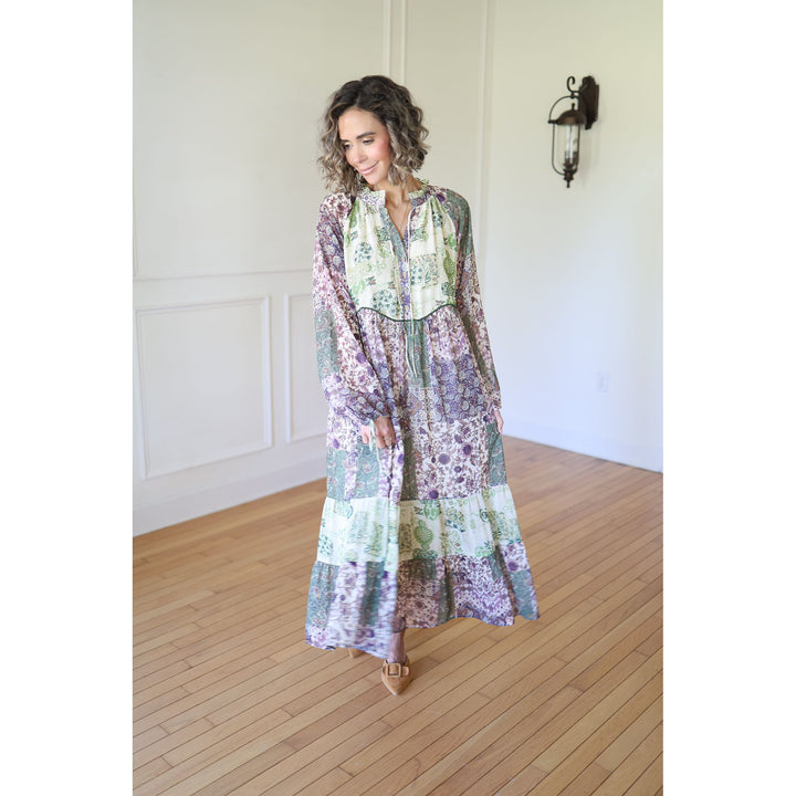 Woman wearing a long, patterned dress 