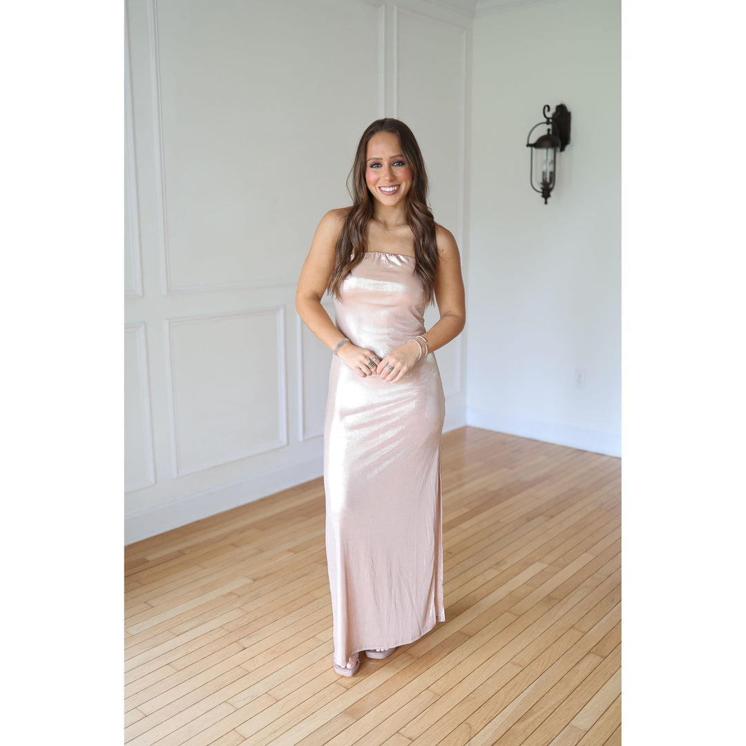 Woman in a long, champagne-colored dress 