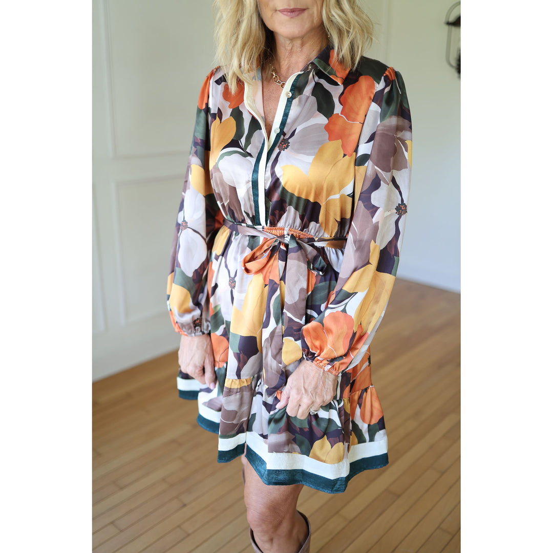 Woman wearing a colorful floral dress 