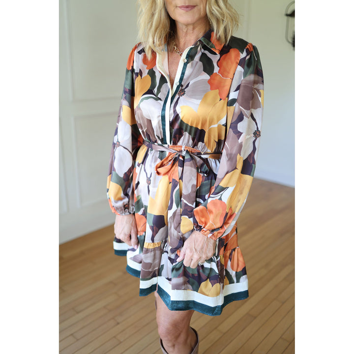 Woman wearing a colorful floral dress 