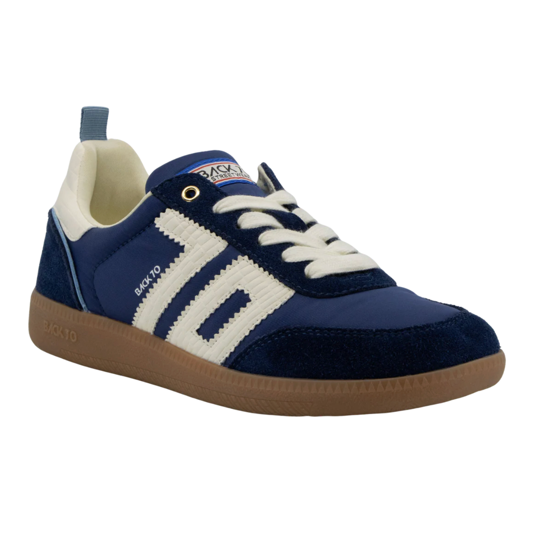 Navy blue and white sneaker with brown sole o