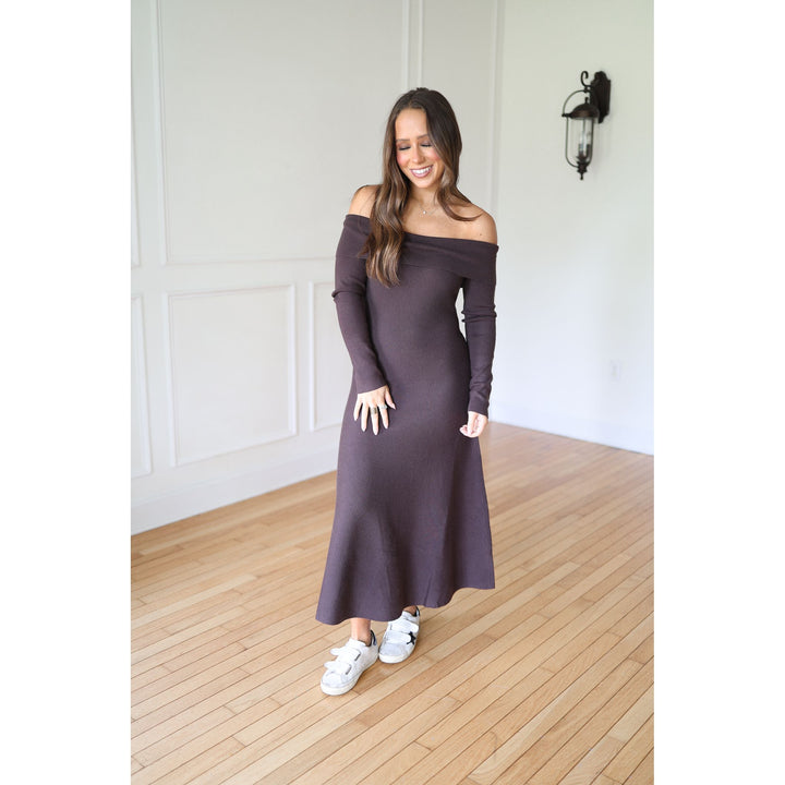 Woman wearing a brown off-shoulder dress 