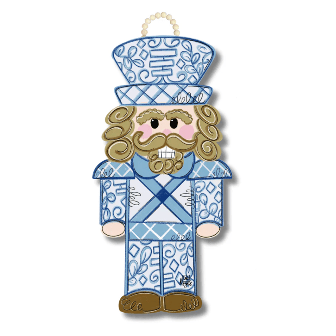 Decorative nutcracker ornament with blue and white pattern 