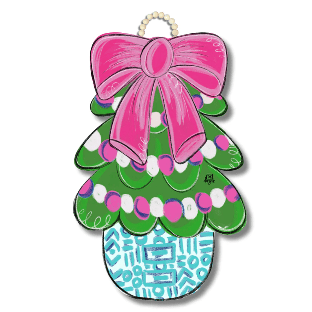 Decorative door hanger with a pink bow, green tree design, and colorful patterns 