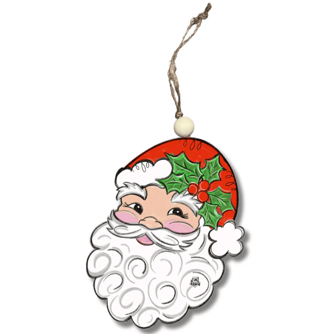 Decorative Christmas ornament with a face of Santa Claus on a white background