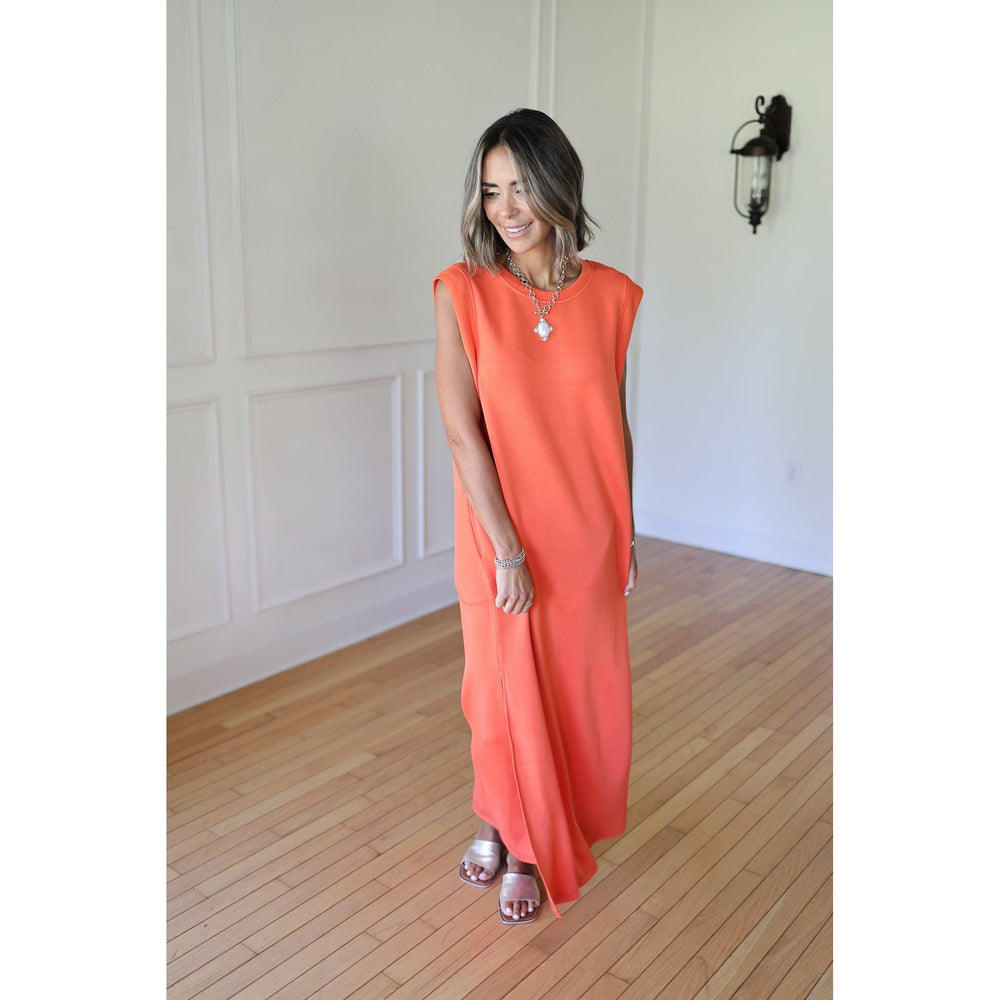 Woman wearing a coral dress 