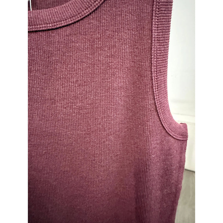 Close-up of a textured wine sleeveless top 