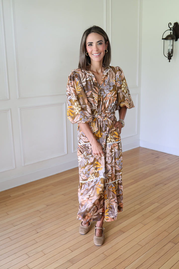 woman wearing brown midi dress