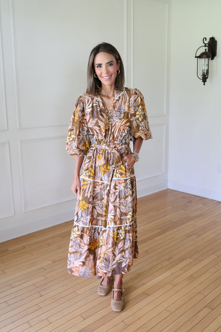 woman wearing brown midi dress
