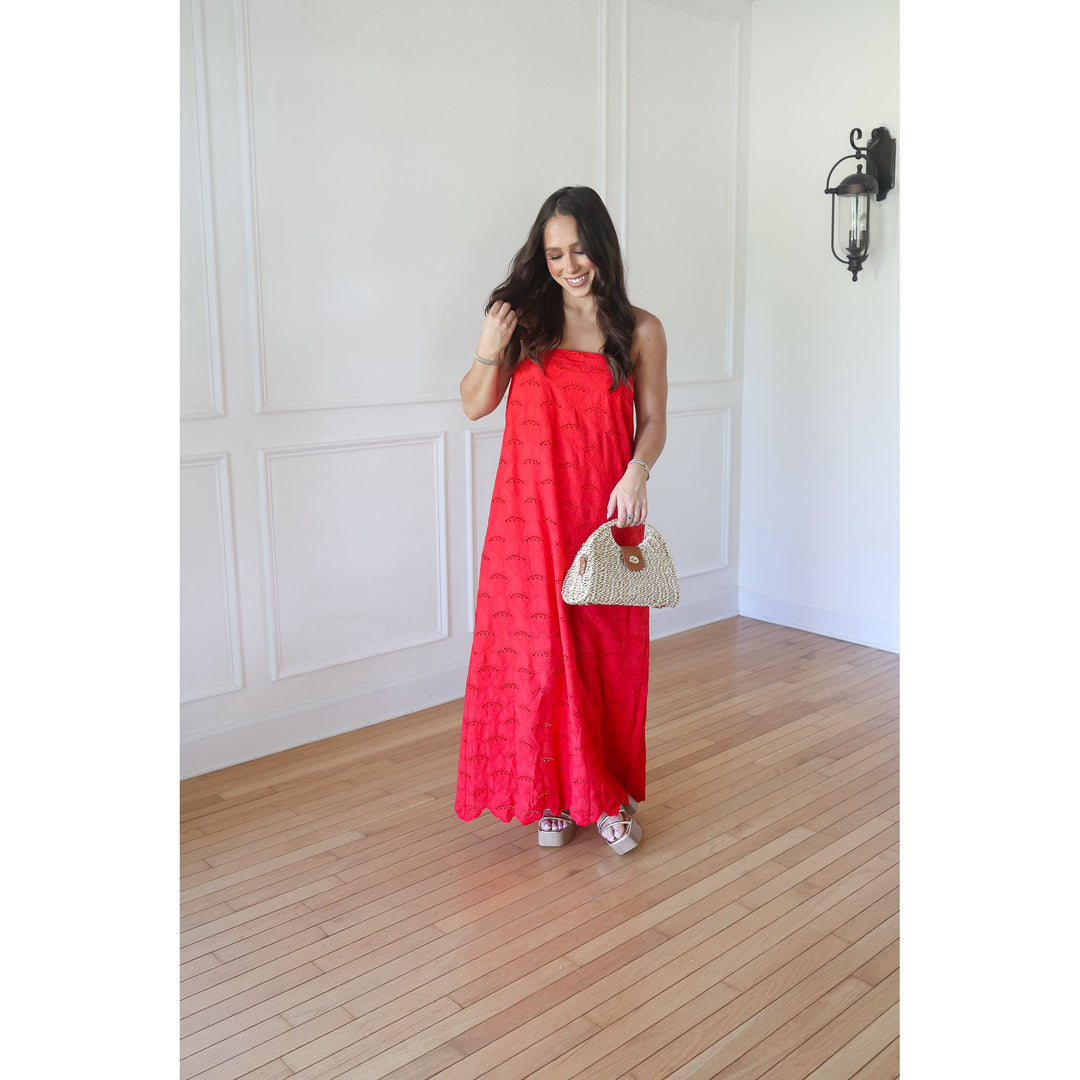 woman wearing red maxi dress