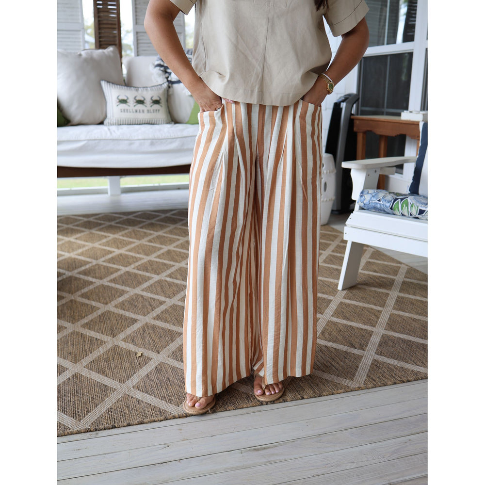 woman wearing brown striped pants