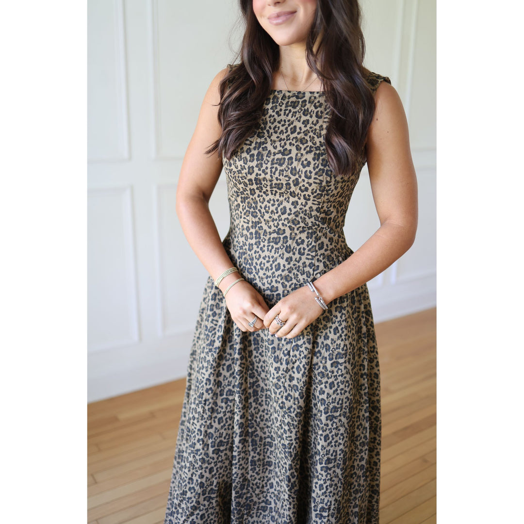 Woman wearing a leopard print dress 