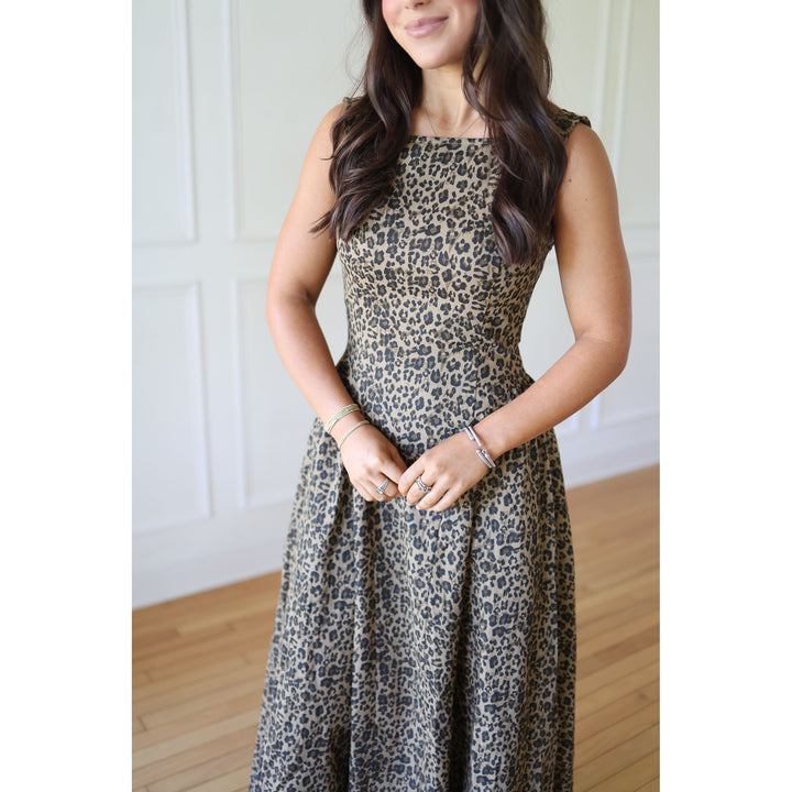 Woman wearing a leopard print dress 