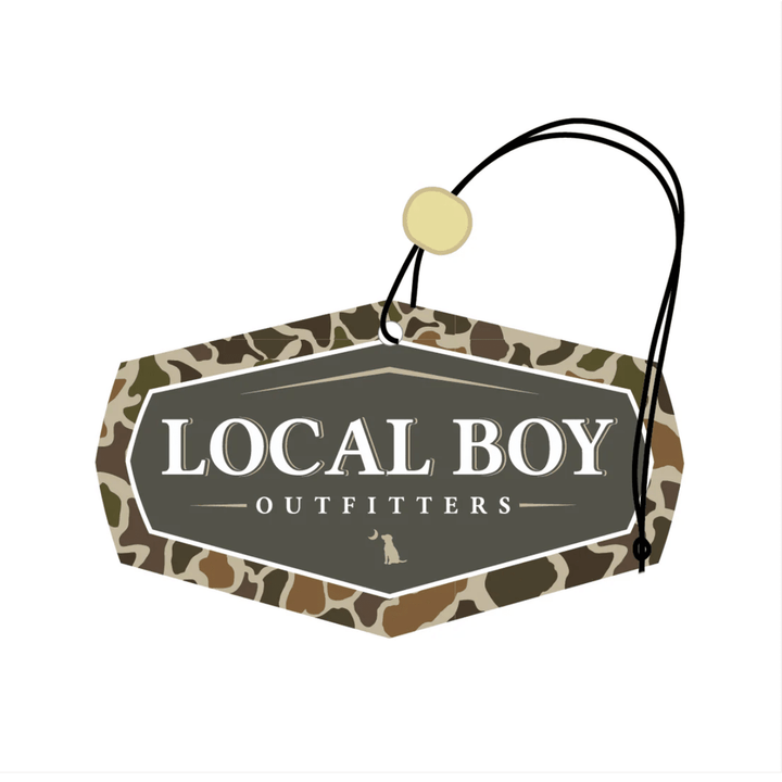 Hexagonal sign with camouflage pattern and 'Local Boy Outfitters' text on a white background