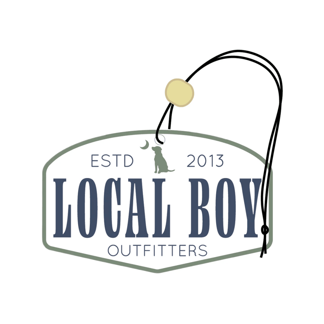 Logo of Local Boy Outfitters with text and a dog icon on a white background