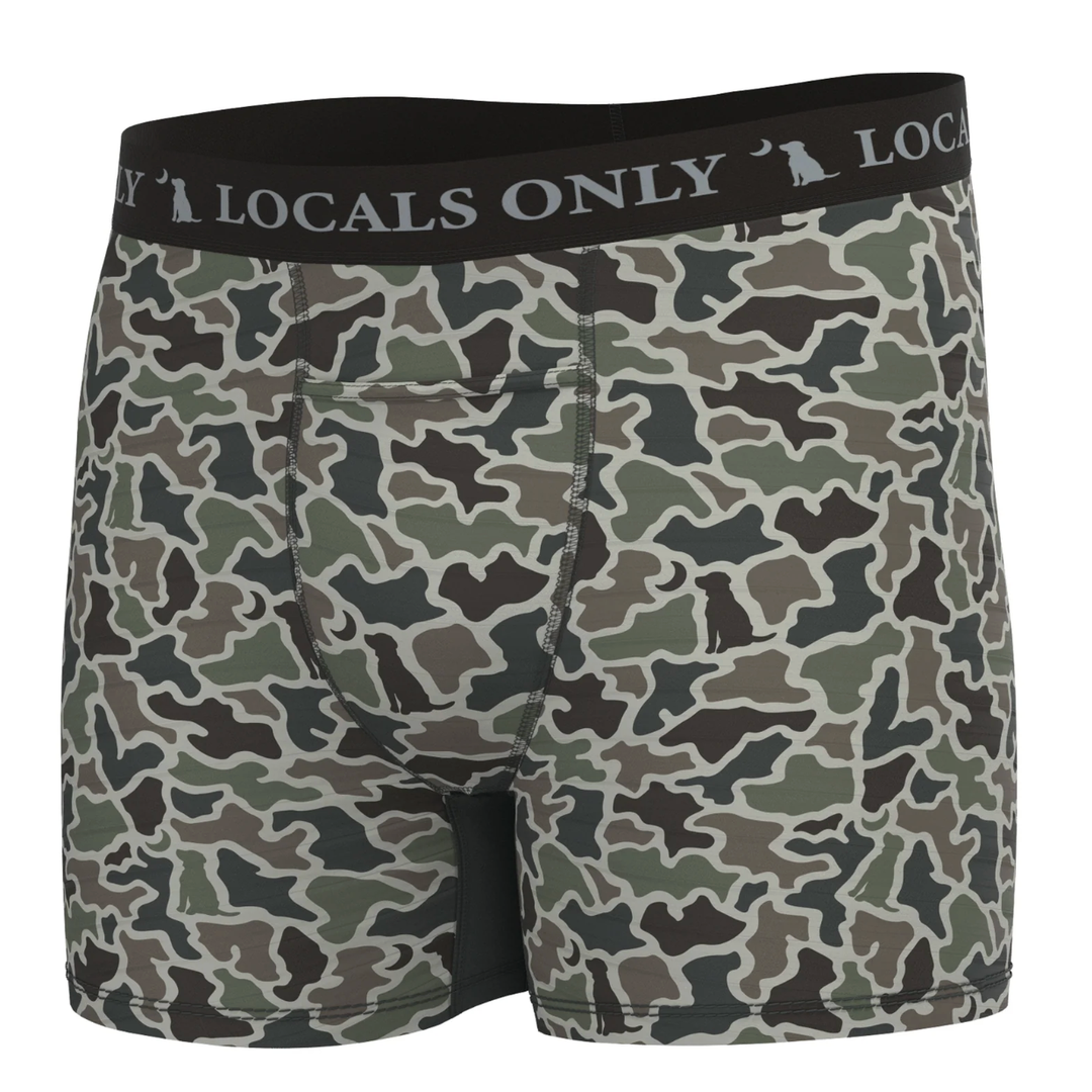 Camouflage-patterned boxer briefs with 'Locals Only' waistband on a white background