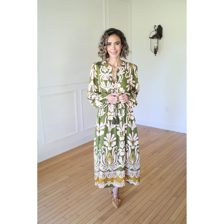 Woman wearing a green floral dress 