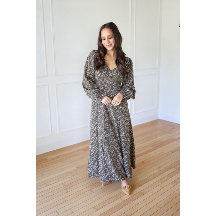Woman wearing a long floral dress 