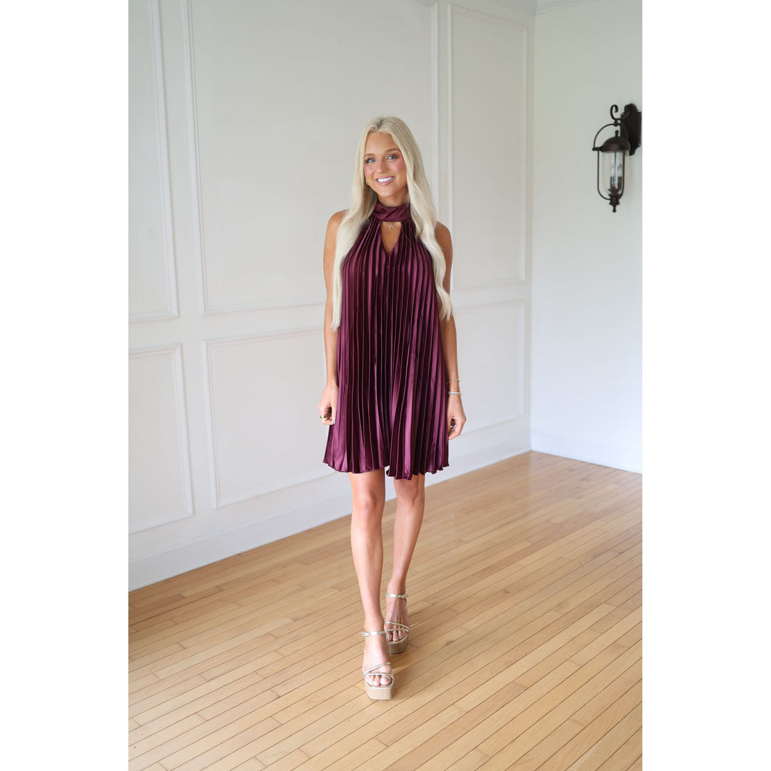 Woman wearing a wine dress 