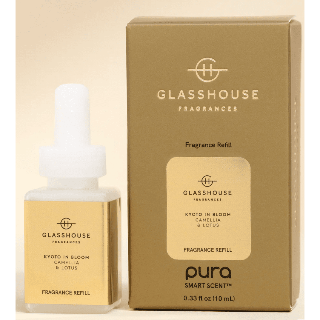 Glasshouse Fragrances fragrance refill bottle and packaging on a beige background