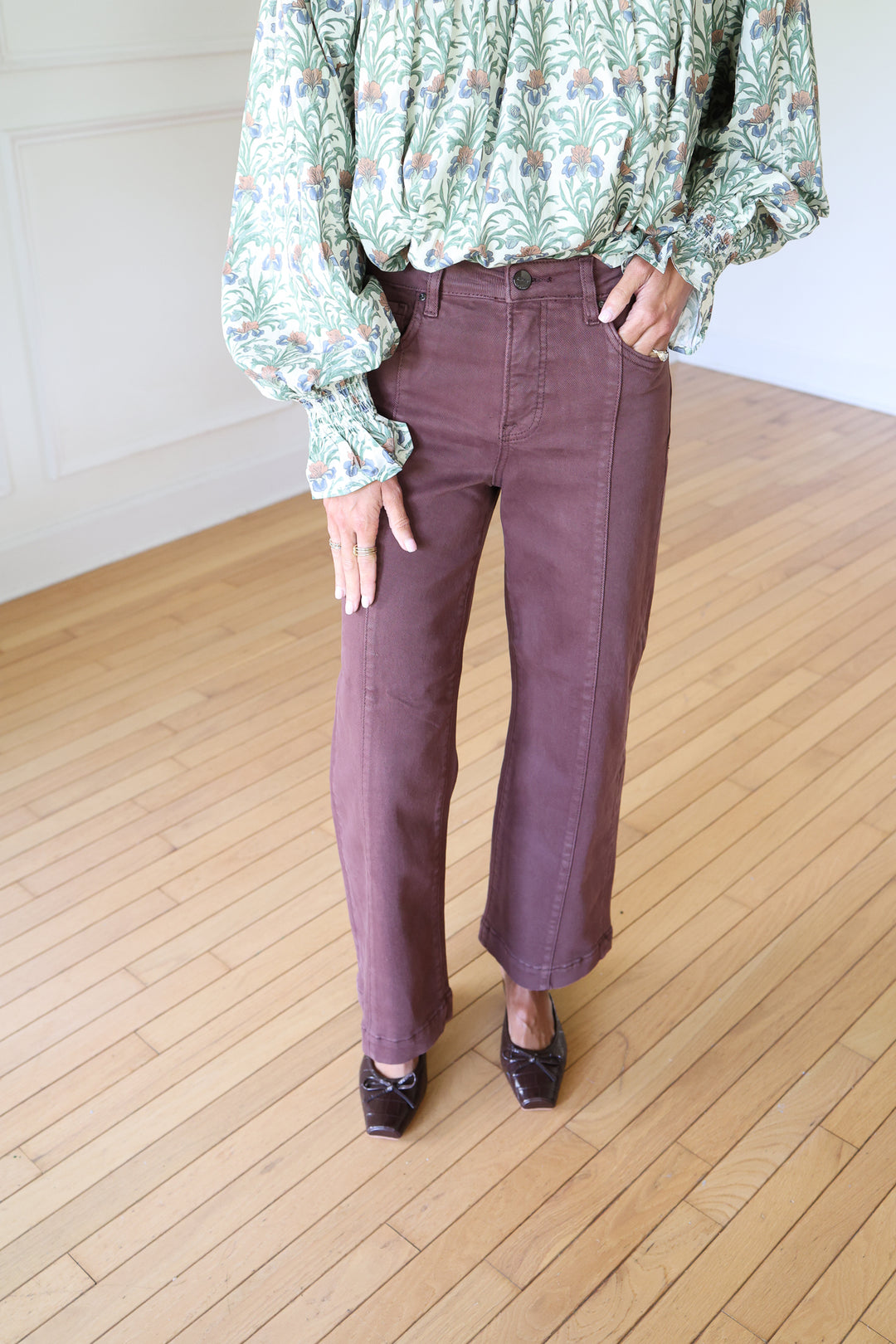 woman wearing brown denim pants