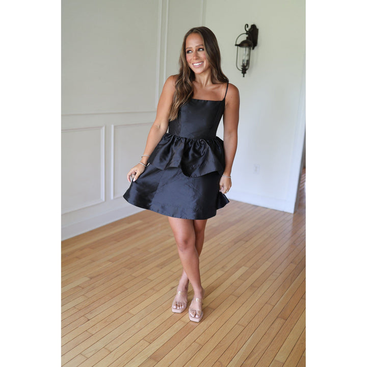 Woman wearing a black dress 