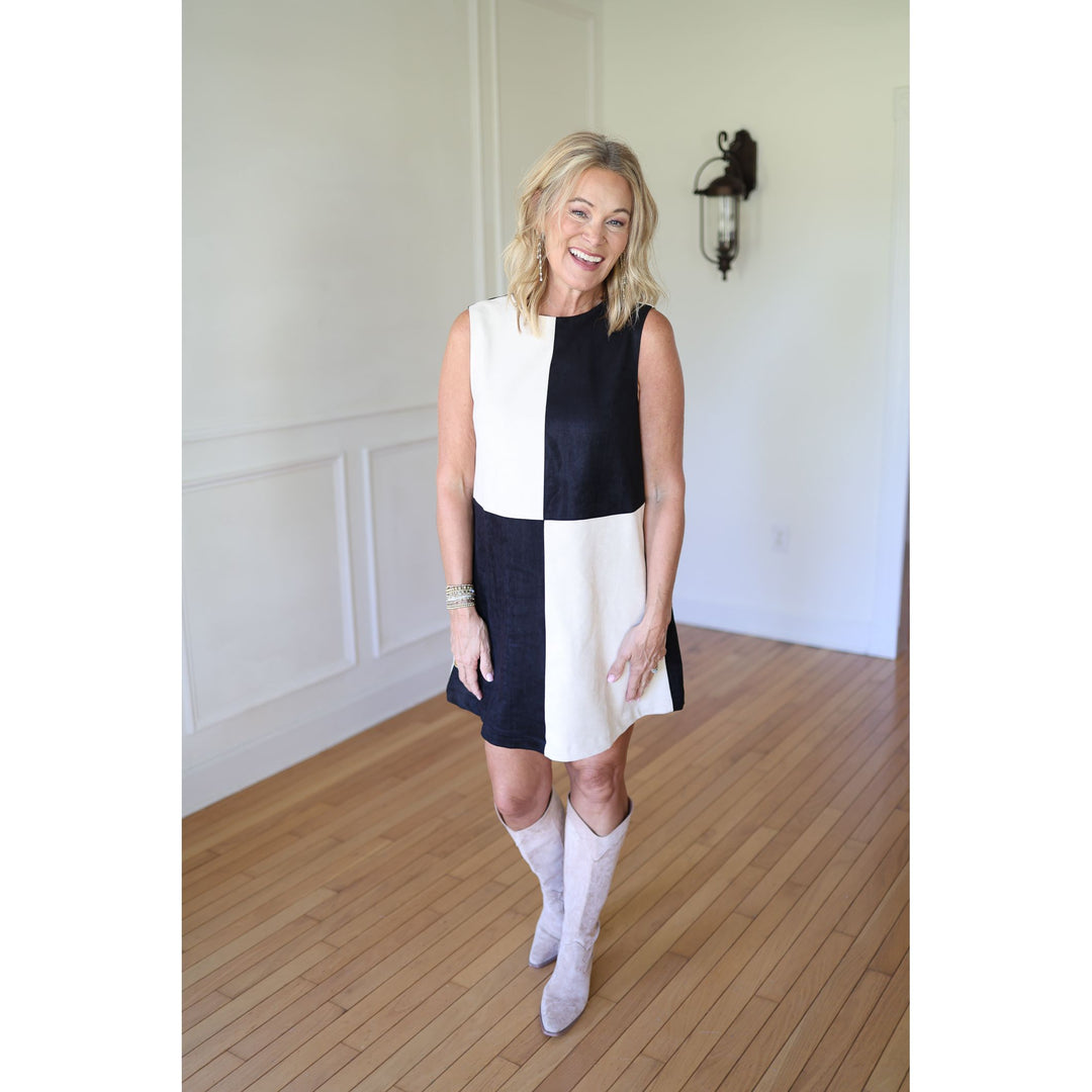 Woman wearing a black and white dress 