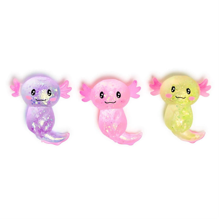 Three colorful axolotl plush toys on a white background
