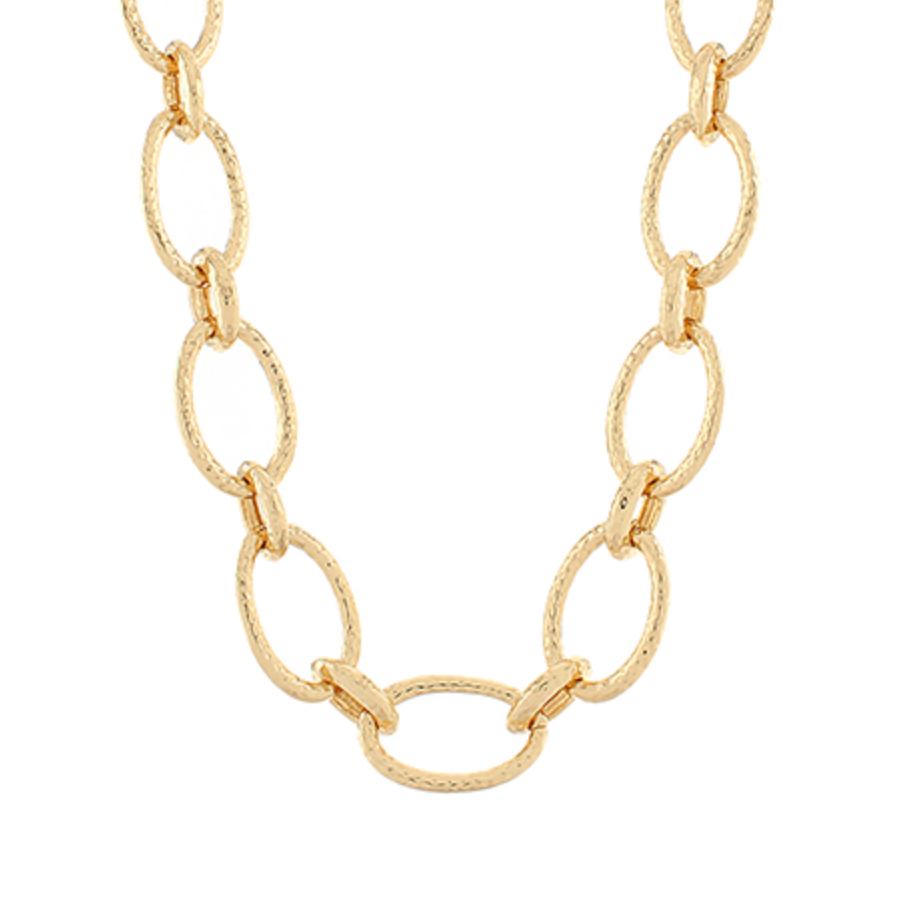 A gold chain necklace with textured oval links.