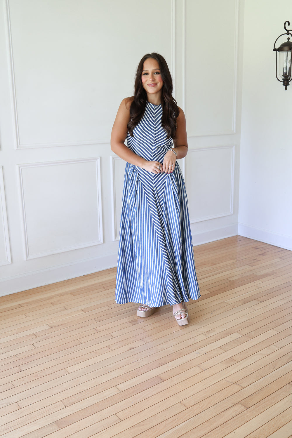 woman wearing denim striped maxi dress