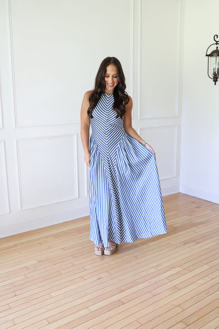 woman wearing denim striped maxi dress