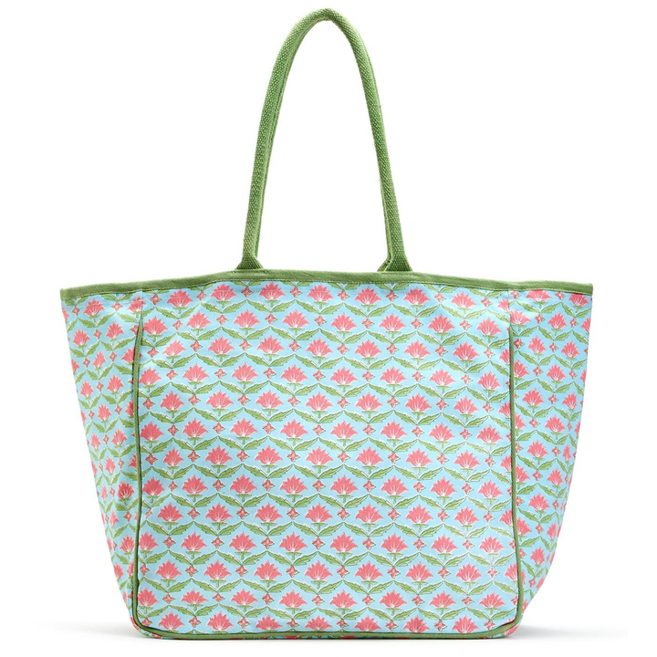 Floral patterned tote bag with green handle 