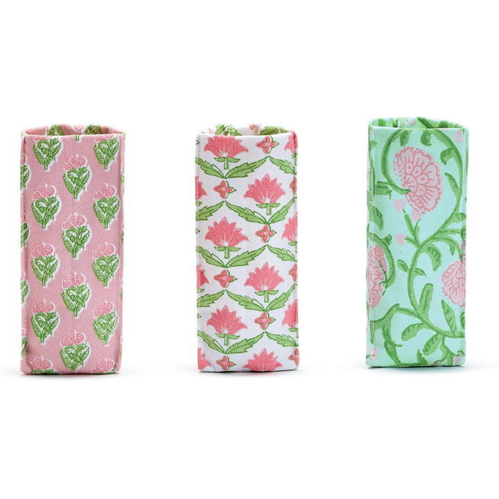 Three fabric pouches with floral patterns 