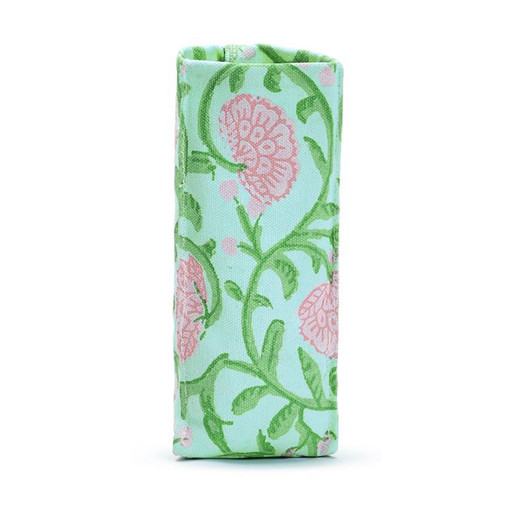 Folded fabric with pink floral pattern on a light blue background