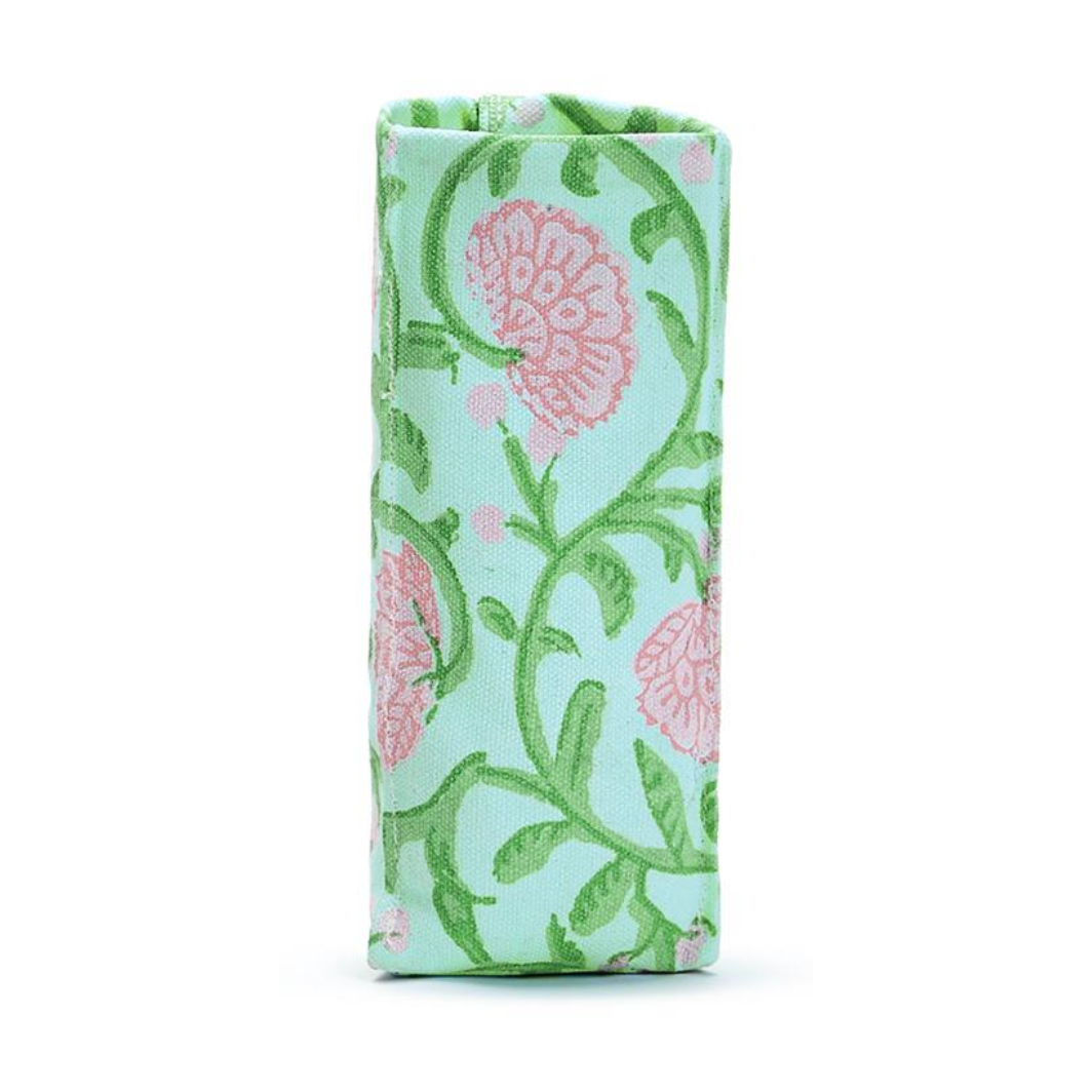 Folded fabric with pink floral pattern on a light blue background