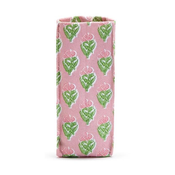 Fabric pouch with green floral pattern on pink background