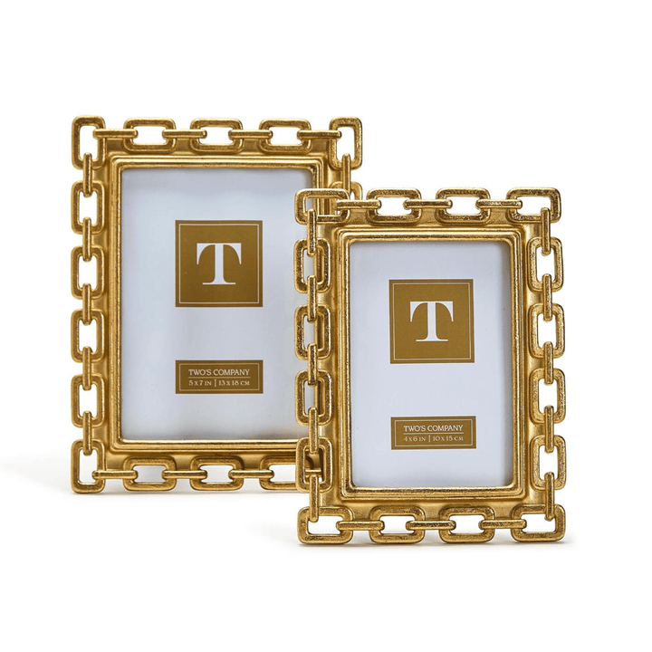 Two gold picture frames with a decorative chain design 