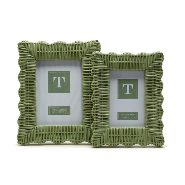 Two green wicker picture frames on a white background