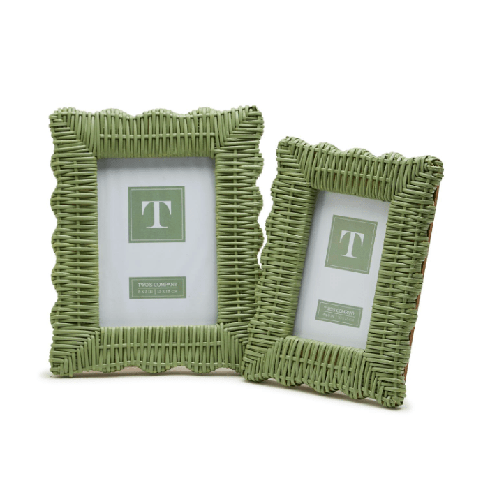 Two green wicker picture frames on a white background