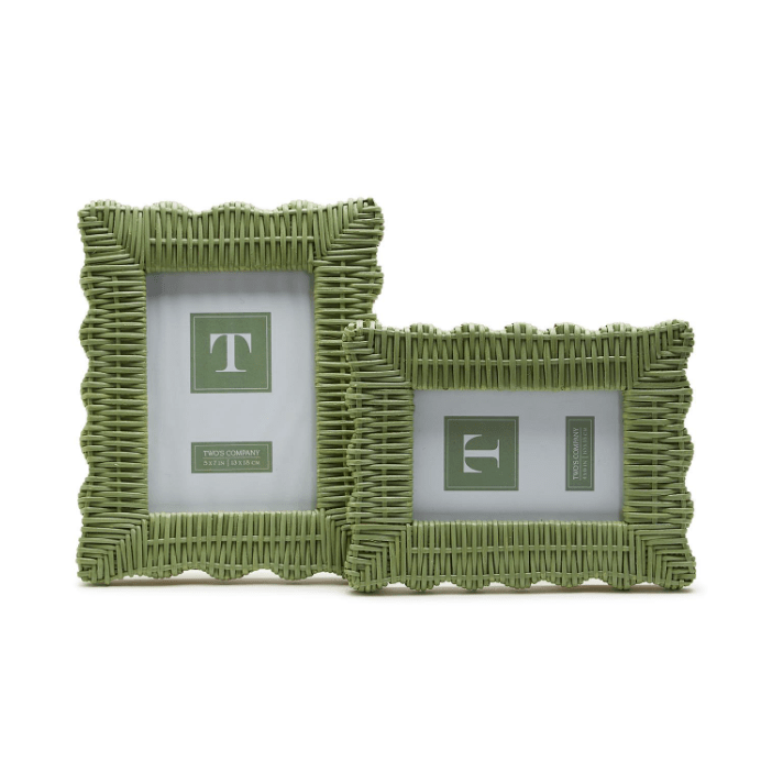 Two green wicker picture frames on a white background