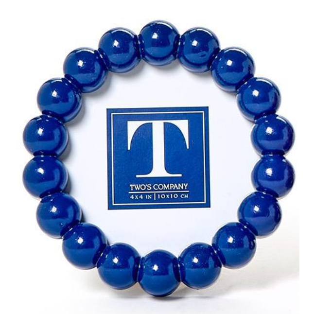 Blue beaded bracelet with a 'Two's Company' logo in the center
